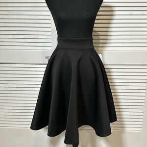 Black Knee-Length Skirt – Flowy Circle Cut (Size Medium, New with Tag)